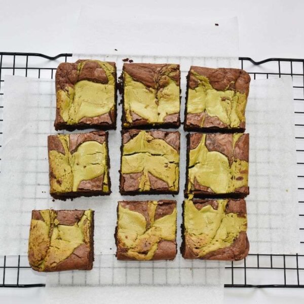 Pistachio brownie slab cut into 9 pieces
